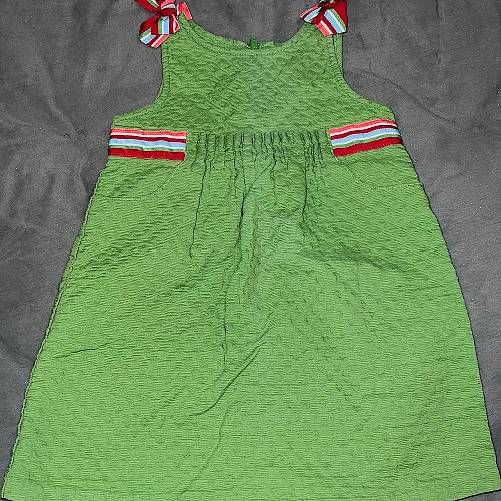 Gymboree kid size 3T green with stripe detail, bow accent  sleeve w/ poc…